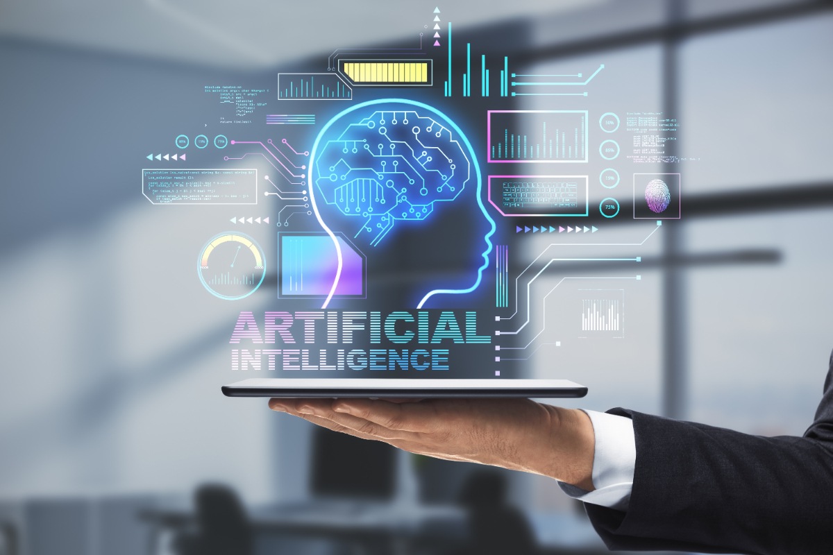 Main tenant un bloc note numérique avec une interface de l'intelligence artificielle